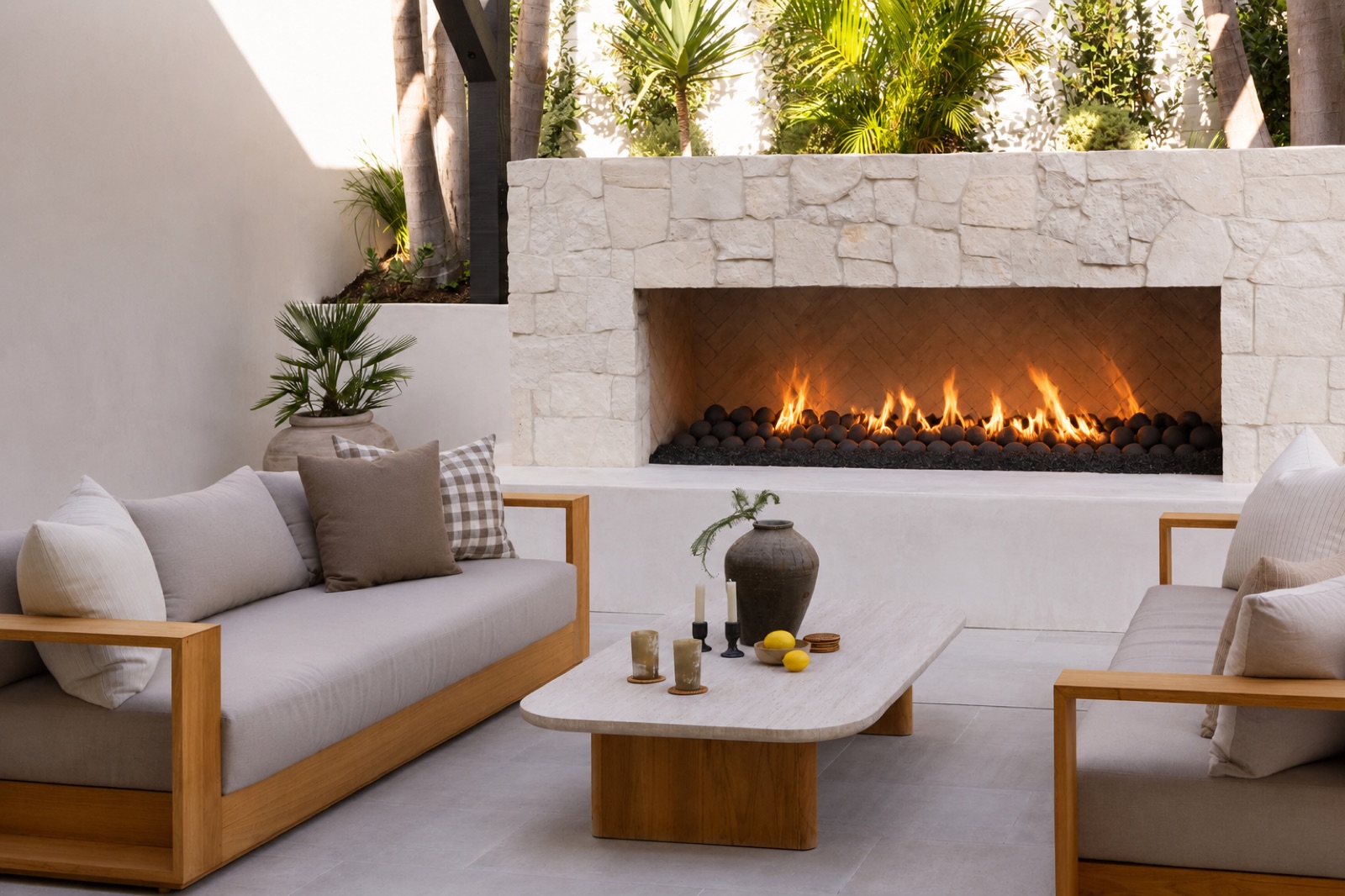 Linear fire feature in a Naples outdoor living space by Knäak Design Group
