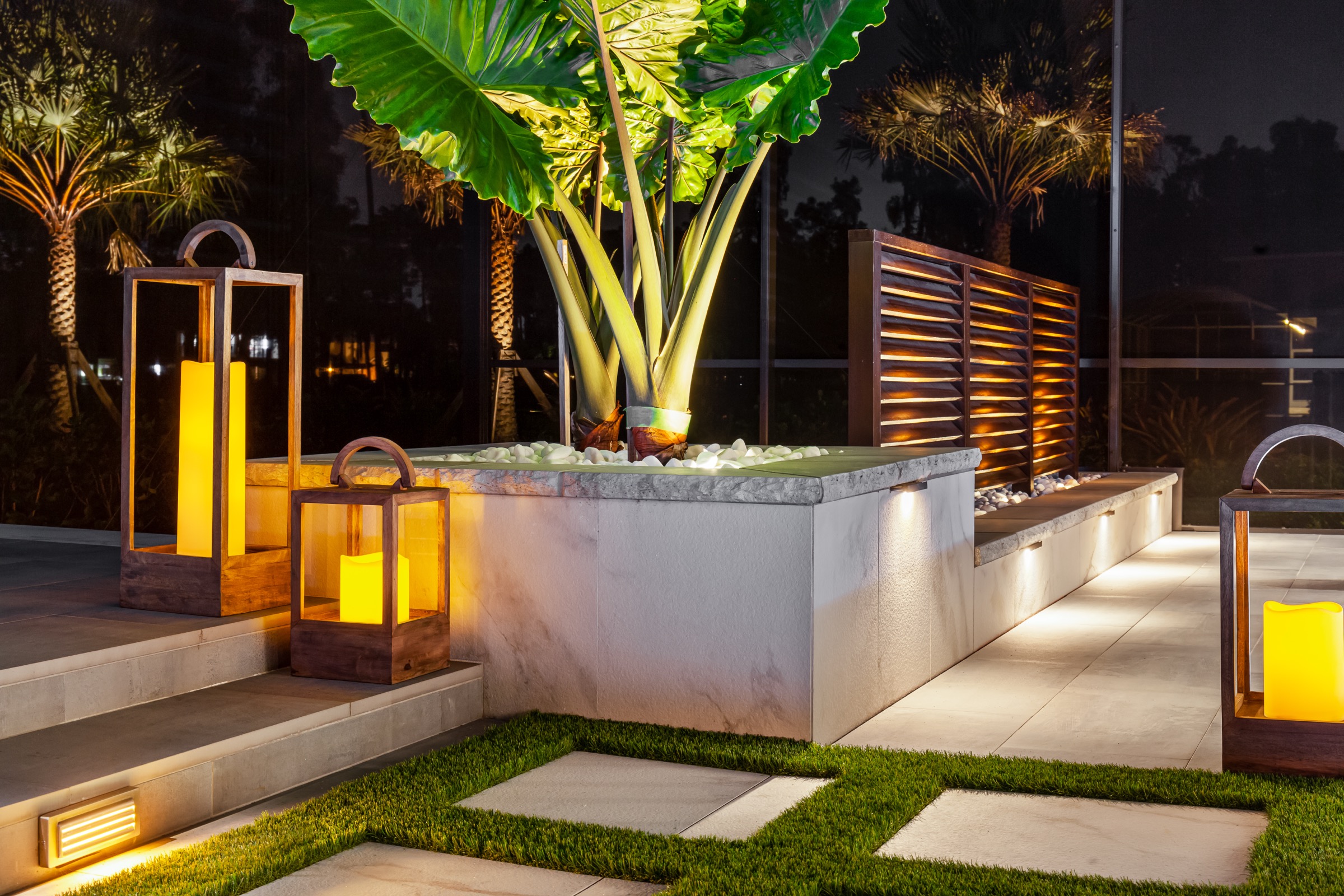 1980s Renovation — landscape lighting with lanterns at night